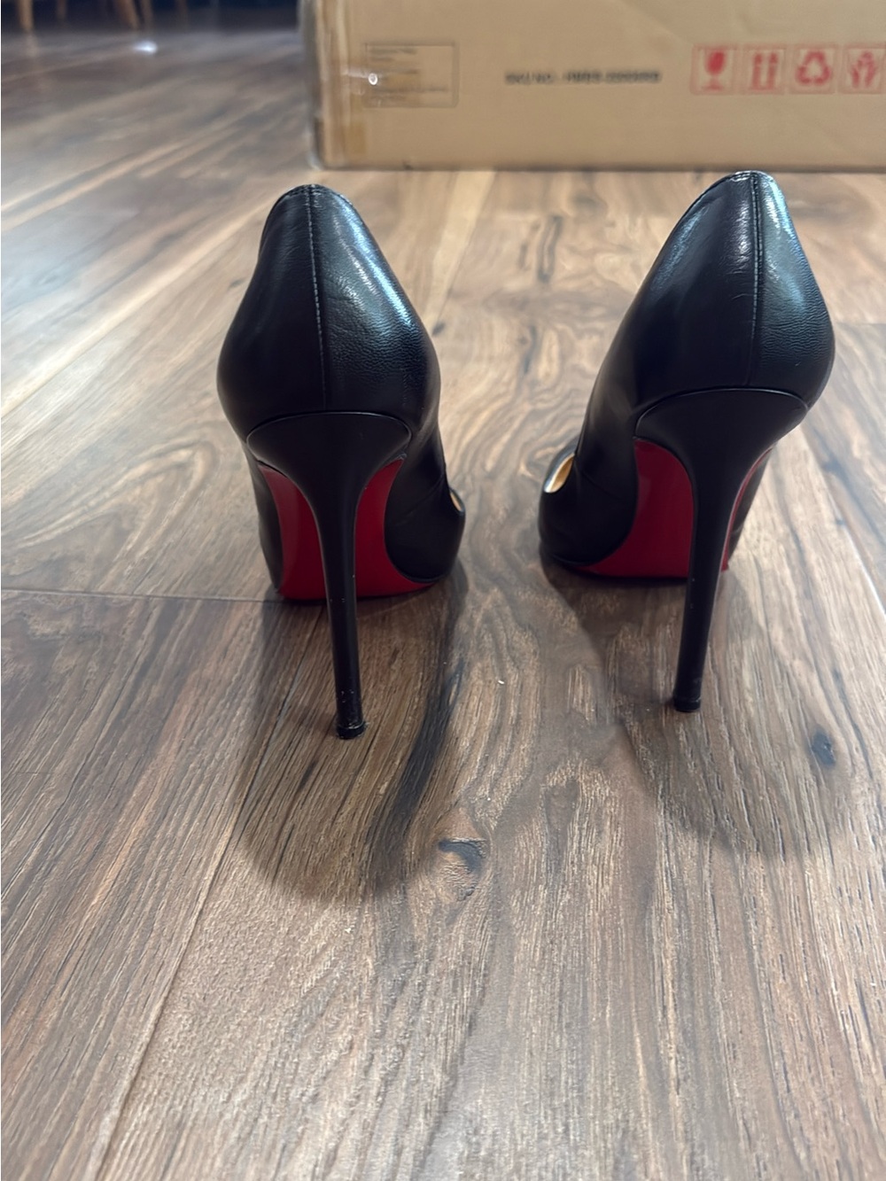 Christian Louboutin Black Leather Stiletto Pumps with Red Sole